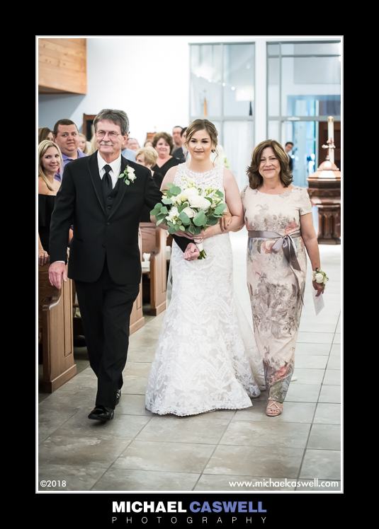 Wedding processional at St. Genevieve church in Slidell