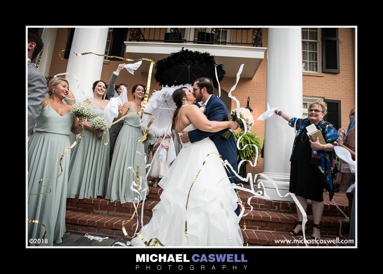 Bride and groom with streamers