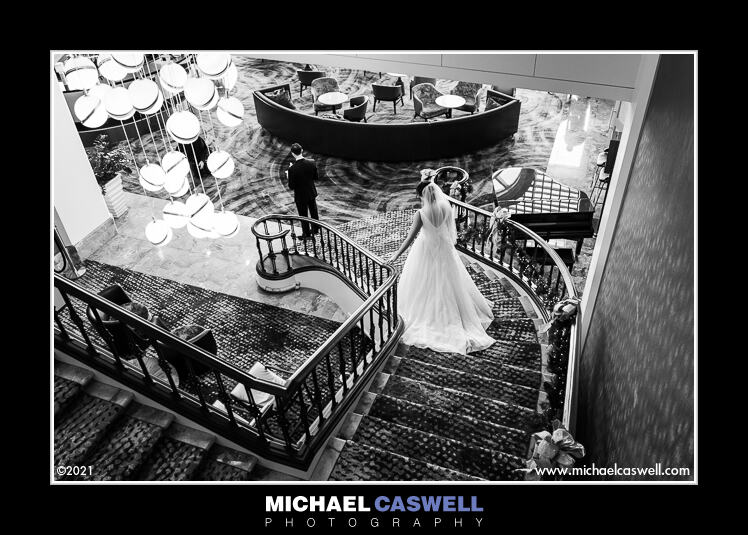 Wedding first look on the Westin grand staircase