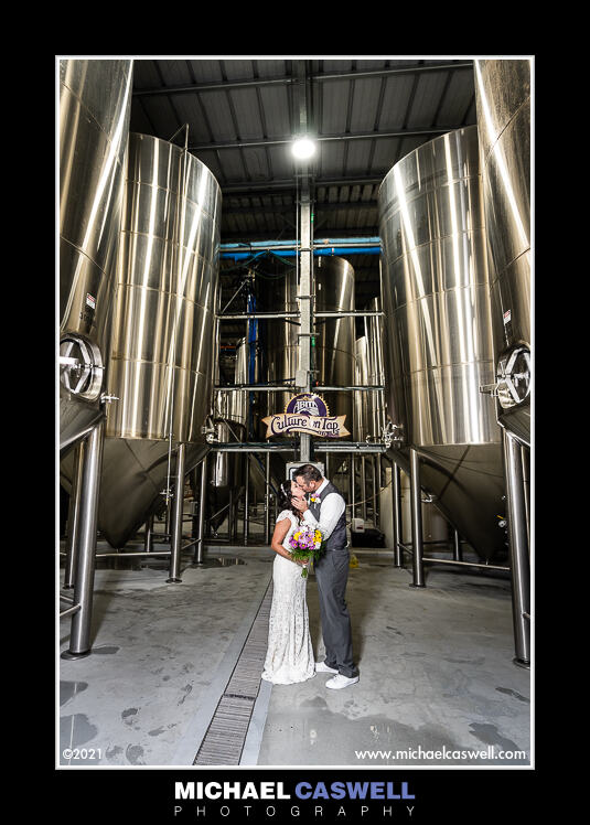 Portrait of bride and groom at Abita Brewery